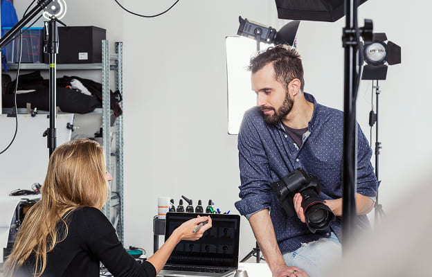 stylist and photographer having discussion in phot 2025 04 04 07 15 52 utc 1